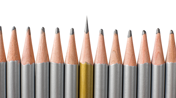 Pencils in front of a white background; one is sharp